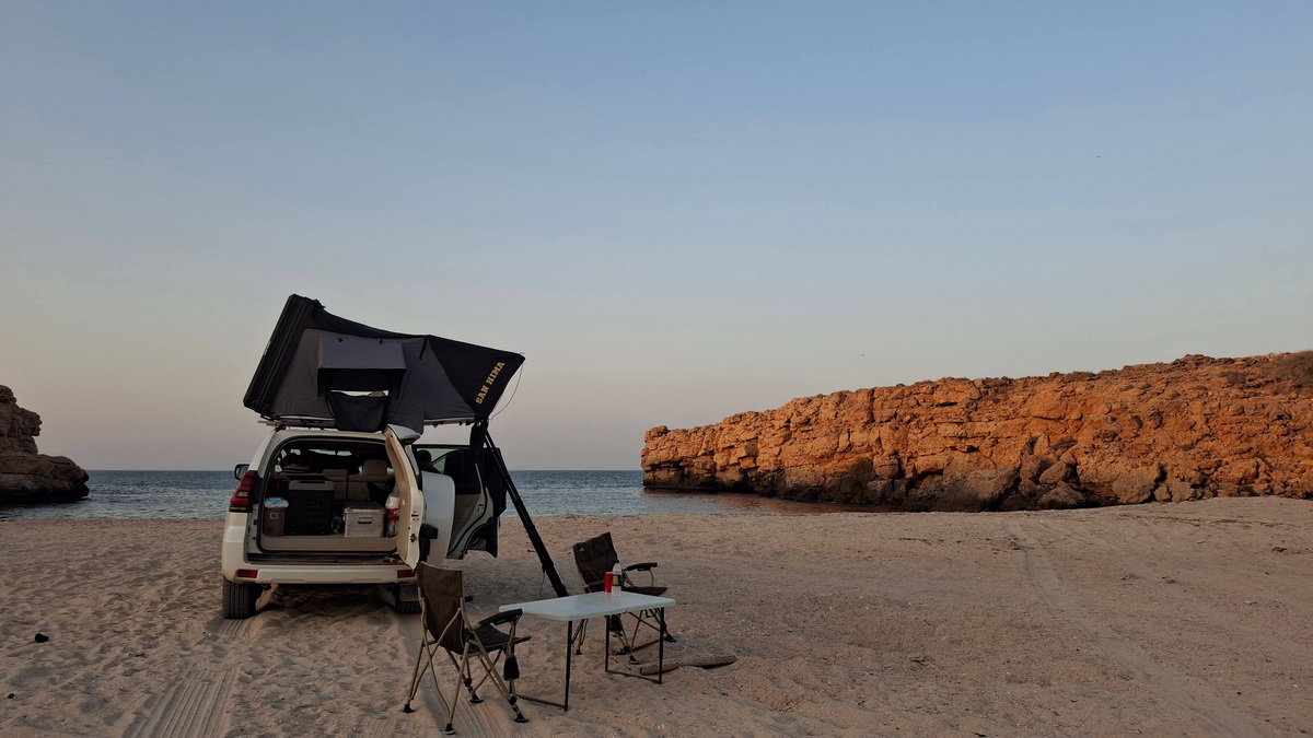 Toyota Prado with rooftop tent at Wadi Shab Beach