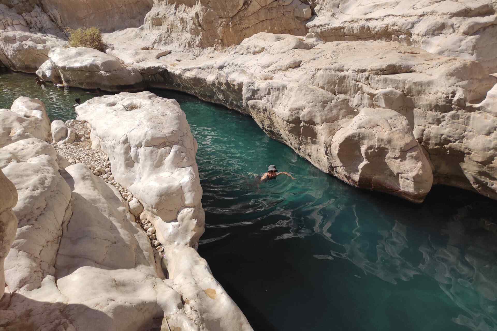 Swimming in the turquoise pools of Wadi Bani Khalid, Oman | nomad